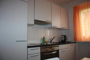 Küche/Küchenzeile in der Unterkunft Swiss Star Residences - Self Check-In