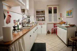 Kuchyň nebo kuchyňský kout v ubytování La Pausetta