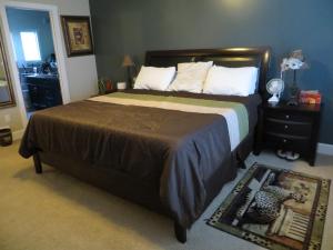 מיטה או מיטות בחדר ב-Windermere Getaway