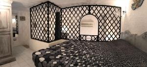 A bed or beds in a room at Il Nido 1