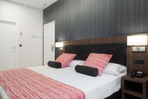 Postel nebo postele na pokoji v ubytování Itaca Artemisa by Soho Boutique