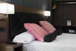 Postel nebo postele na pokoji v ubytování Itaca Artemisa by Soho Boutique