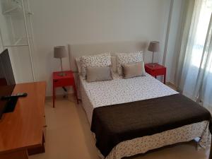 Posteľ alebo postele v izbe v ubytovaní Fan Flat Torremolinos