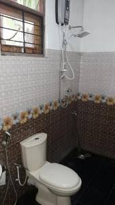 Vonios kambarys apgyvendinimo įstaigoje Susee Villa