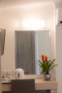 Кухня или кухненски бокс в Castello Boutique Rooms