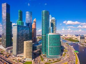 a view of a city with many tall buildings at Novotel Moscow City in Moscow