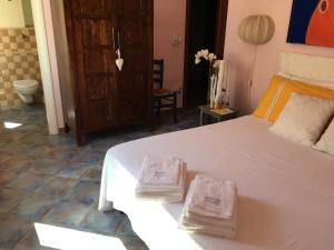 Letto o letti in una camera di Bogamarì