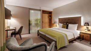 Ein Bett oder Betten in einem Zimmer der Unterkunft Gasthaus Forster am See - Eching bei Landshut