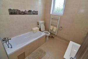 Koupelna v ubytování City Premium Apartments + 20 fotografií