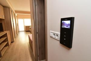 Un televizor și/sau centru de divertisment la City Premium Apartments