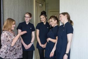 a group of women standing next to each other at Nether Abbey Hotel in North Berwick