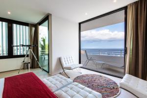 Posteľ alebo postele v izbe v ubytovaní Gran Hotel Reymar 4 Sup