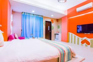 Ένα ή περισσότερα κρεβάτια σε δωμάτιο στο Capri Homestay