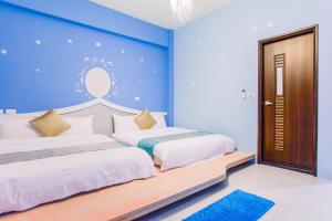 Cama o camas de una habitación en Capri Homestay