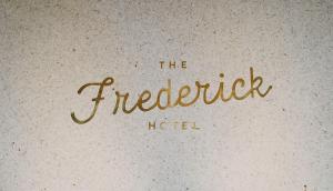 a sign with a picture of a dog on it at The Frederick Hotel Tribeca in New York