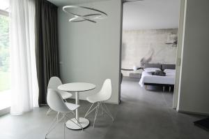 Postel nebo postele na pokoji v ubytování Ca' Barbini Resort