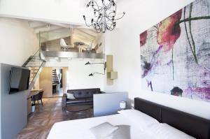 TV a/nebo společenská místnost v ubytování Ca' Barbini Resort