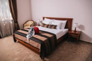Posteľ alebo postele v izbe v ubytovaní Hotel Stara Lika