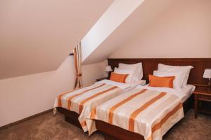 Posteľ alebo postele v izbe v ubytovaní Hotel Stara Lika