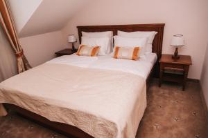 Posteľ alebo postele v izbe v ubytovaní Hotel Stara Lika