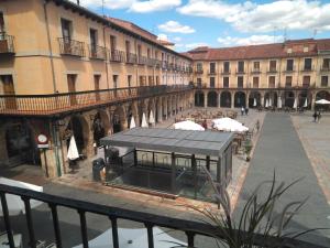 a view of a street in a city with buildings at Apartamentos Viva León in León