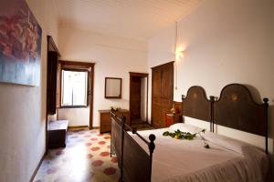 Postel nebo postele na pokoji v ubytování B & B Stillachiara