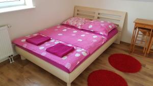 Postel nebo postele na pokoji v ubytování Gościniec Mazurek