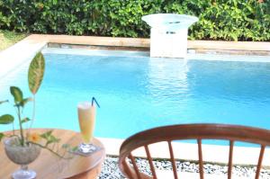 Der Swimmingpool an oder in der Nähe von Nike Villas