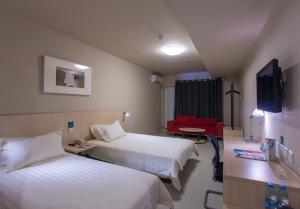 Posteľ alebo postele v izbe v ubytovaní Jinjiang Inn Beijing Gucheng North Road