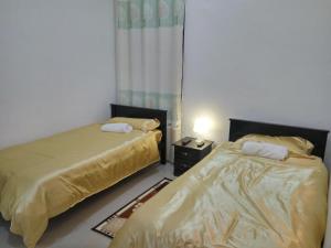 Postel nebo postele na pokoji v ubytování H2O Apartment