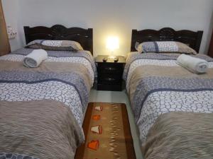 Postel nebo postele na pokoji v ubytování H2O Apartment