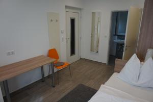 Ein Bett oder Betten in einem Zimmer der Unterkunft Gösserhof