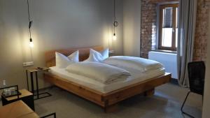 Postel nebo postele na pokoji v ubytování Berghotel Sammüller