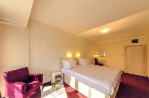Katil atau katil-katil dalam bilik di Philia Hotel