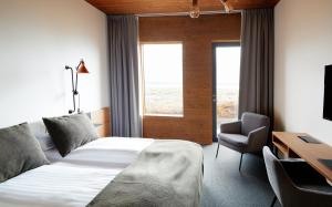 Fosshotel Mývatn客房内的一张或多张床位