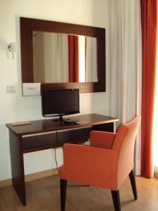TV a/nebo společenská místnost v ubytování Hotel Alfageme