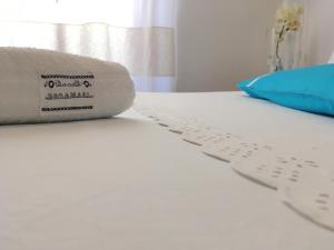 Letto o letti in una camera di Bogamarì