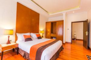 Postel nebo postele na pokoji v ubytování Alba Hotel Meru