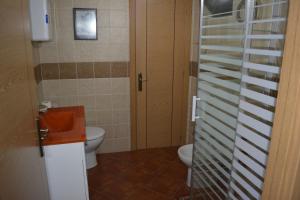 Ein Badezimmer in der Unterkunft La Casa de Rosa