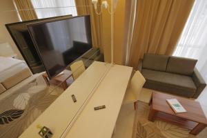 TV a/nebo společenská místnost v ubytování Horizont Hotel