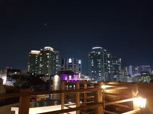 a view of a city skyline at night at Crib 49 Guesthouse - Foreigner only in Seoul