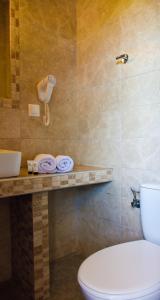 Koupelna v ubytování Anna Pousi Studios & Apartment