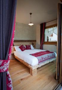 A bed or beds in a room at Chalet Teo e Marianna