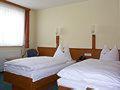 Postel nebo postele na pokoji v ubytování Hotel am Platz + 11 fotografií