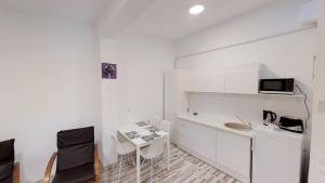 Η κουζίνα ή μικρή κουζίνα στο Sun Villa Residence