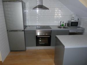 Kuchyňa alebo kuchynka v ubytovaní Apartamento Zapatero + 36 fotografií