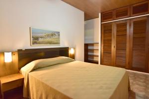 Cama ou camas em um quarto em Pousada Tanto Mar
