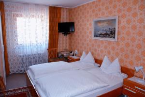 Postel nebo postele na pokoji v ubytování Privatzimmer Lasshofer