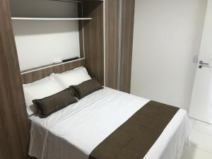 Cama o camas de una habitación en Apart Hotel Rio Stay