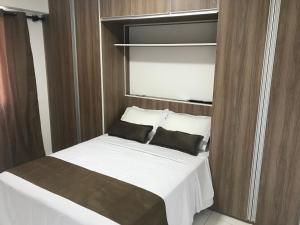 Cama o camas de una habitación en Apart Hotel Rio Stay